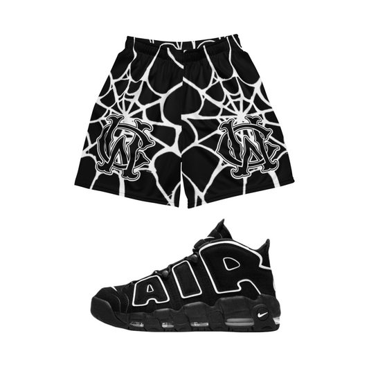 Side view of the Wolves Cry Originals OG Mesh Shorts in black, highlighting the elastic waistband and deep side pockets. Designed for comfort, style, and sustainable impact.