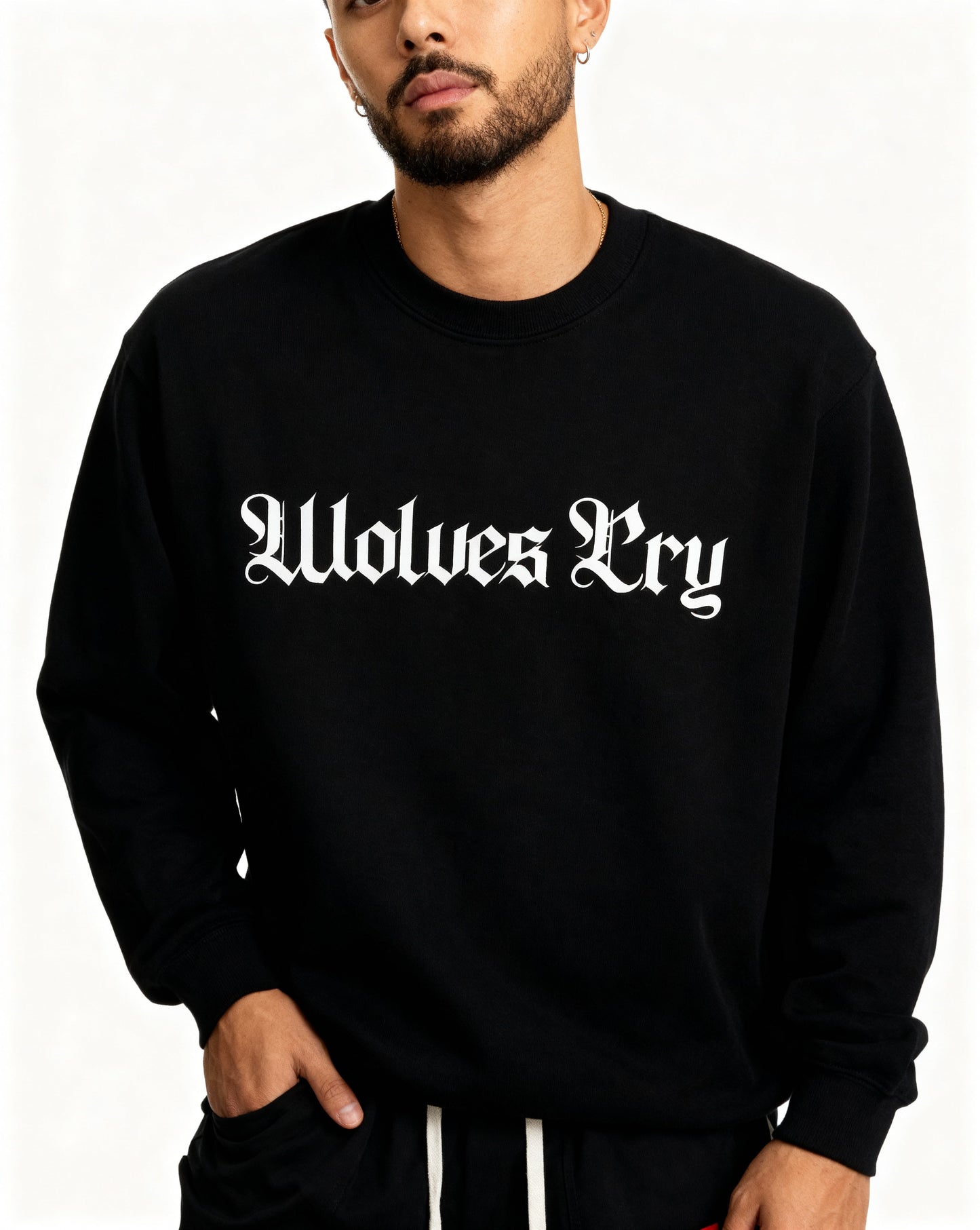 Model wearing Wolves Cry Everyday Crew in black and white — timeless monochrome design blending street heritage with modern simplicity.