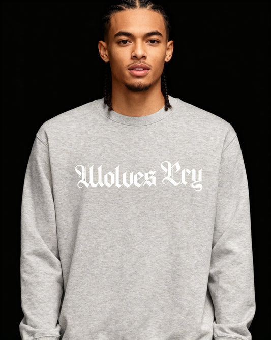 Model wearing Wolves Cry Everyday Crew in heather grey and white — minimalist heritage design with timeless athletic edge.