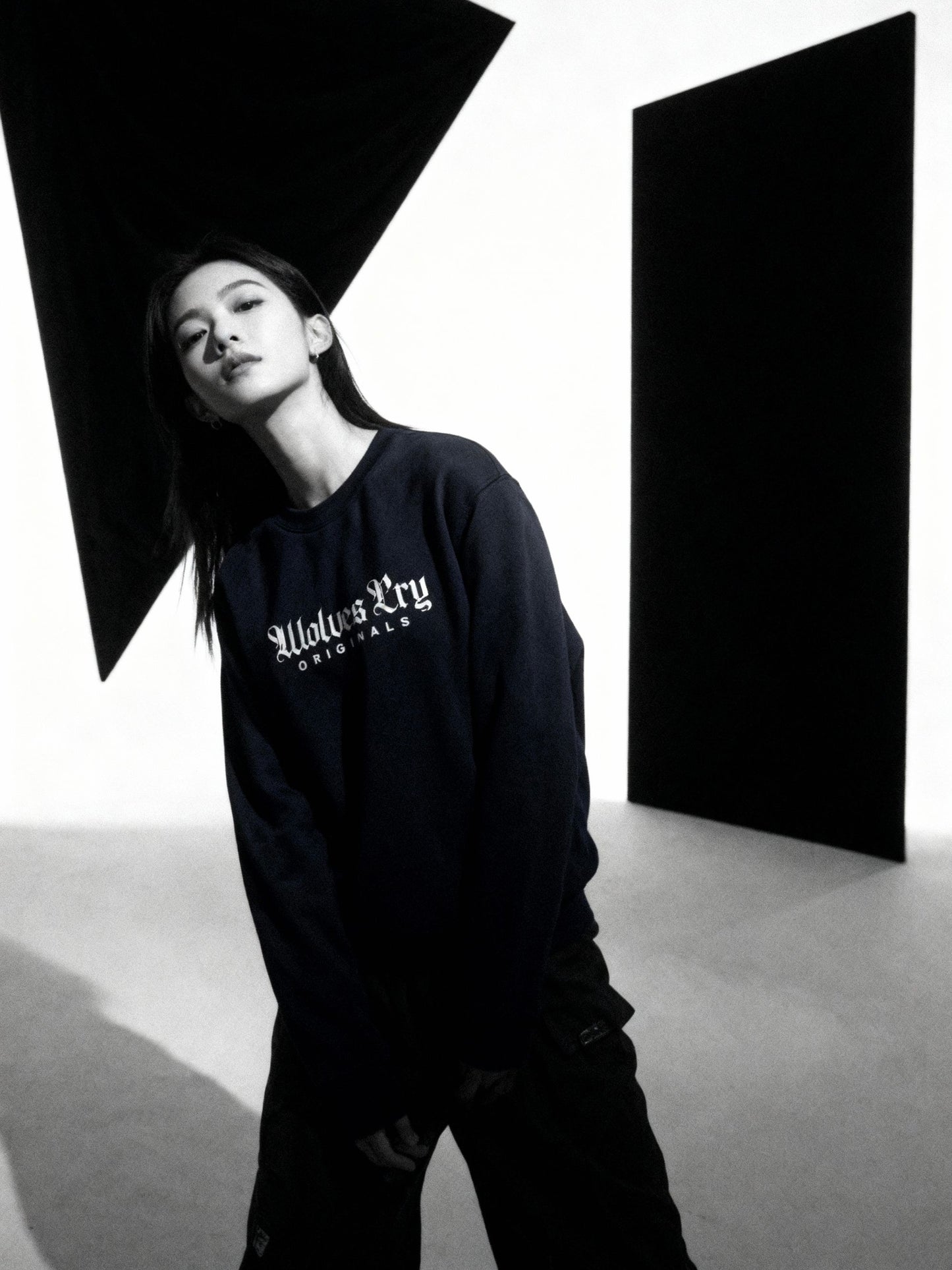 Wolves Cry Embroidered Plain Jane Crew in navy captured in motion — relaxed fit, everyday streetwear elevated through craftsmanship