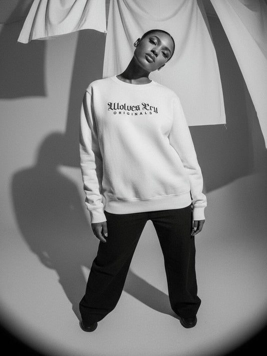 Close-up of Wolves Cry Embroidered Plain Jane Crew in white, highlighting tonal embroidery and premium cotton weave.