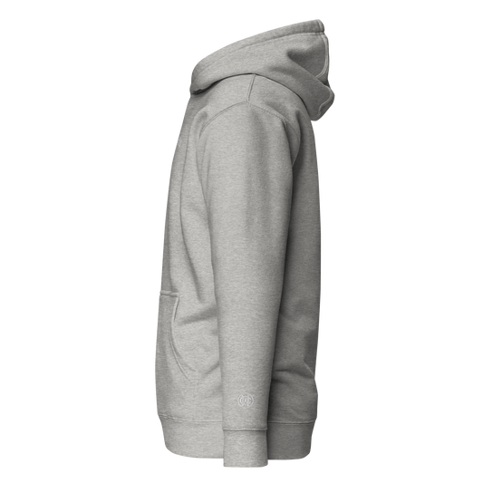 Side view of heather grey Wolves Cry Hoodie highlighting wrist monogram embroidery and soft cotton texture.