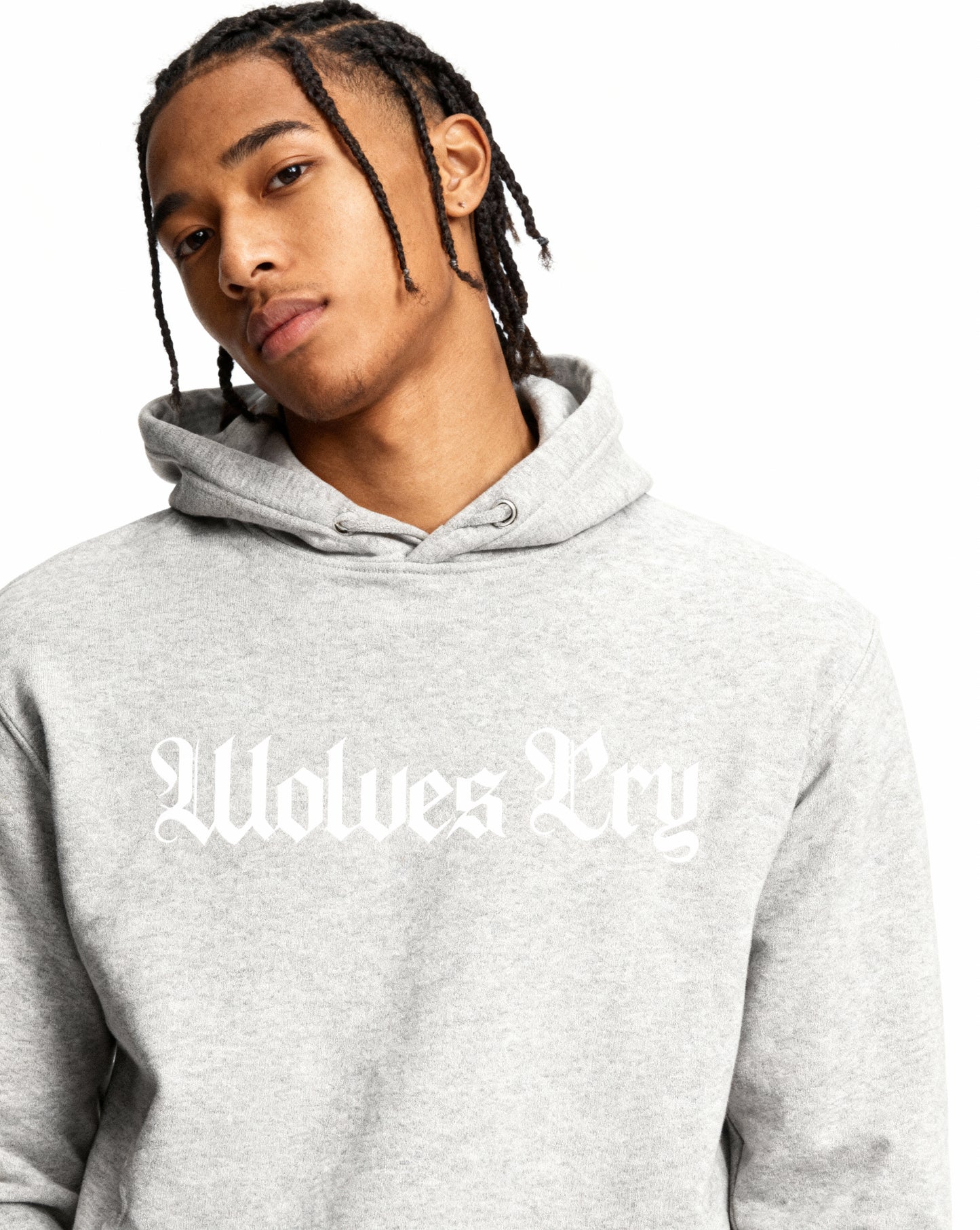 Model wearing Wolves Cry Everyday Spellout Hoodie in heather grey and white — clean, classic, and timeless with subtle contrast and effortless style.