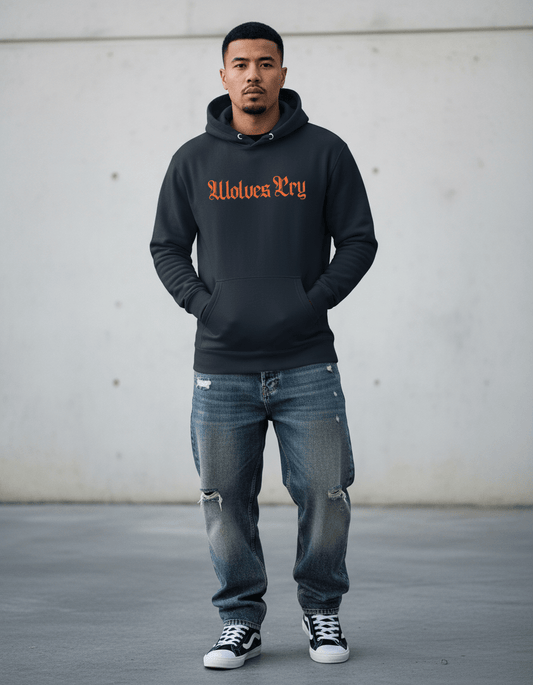 Model wearing Wolves Cry Everyday Spellout Hoodie in navy and orange under studio lighting — clean, confident streetwear with vintage sports energy.