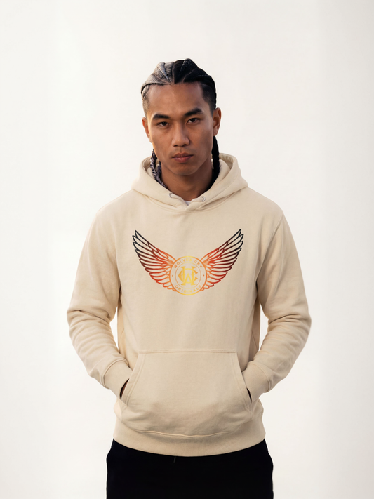 Person wearing wolves cry beige hoodie with a logo on a white background