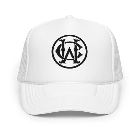 Wolves Cry White WC Foam Trucker Hat featuring the embroidered WC monogram logo on a white foam front, combining retro style with clean, bold design.