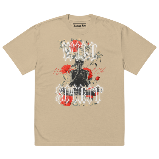 Flatlay of the Wild Spirit Prayer Tee in khaki featuring vivid red roses, meditating skeleton artwork, and gothic white text on premium heavyweight fabric.