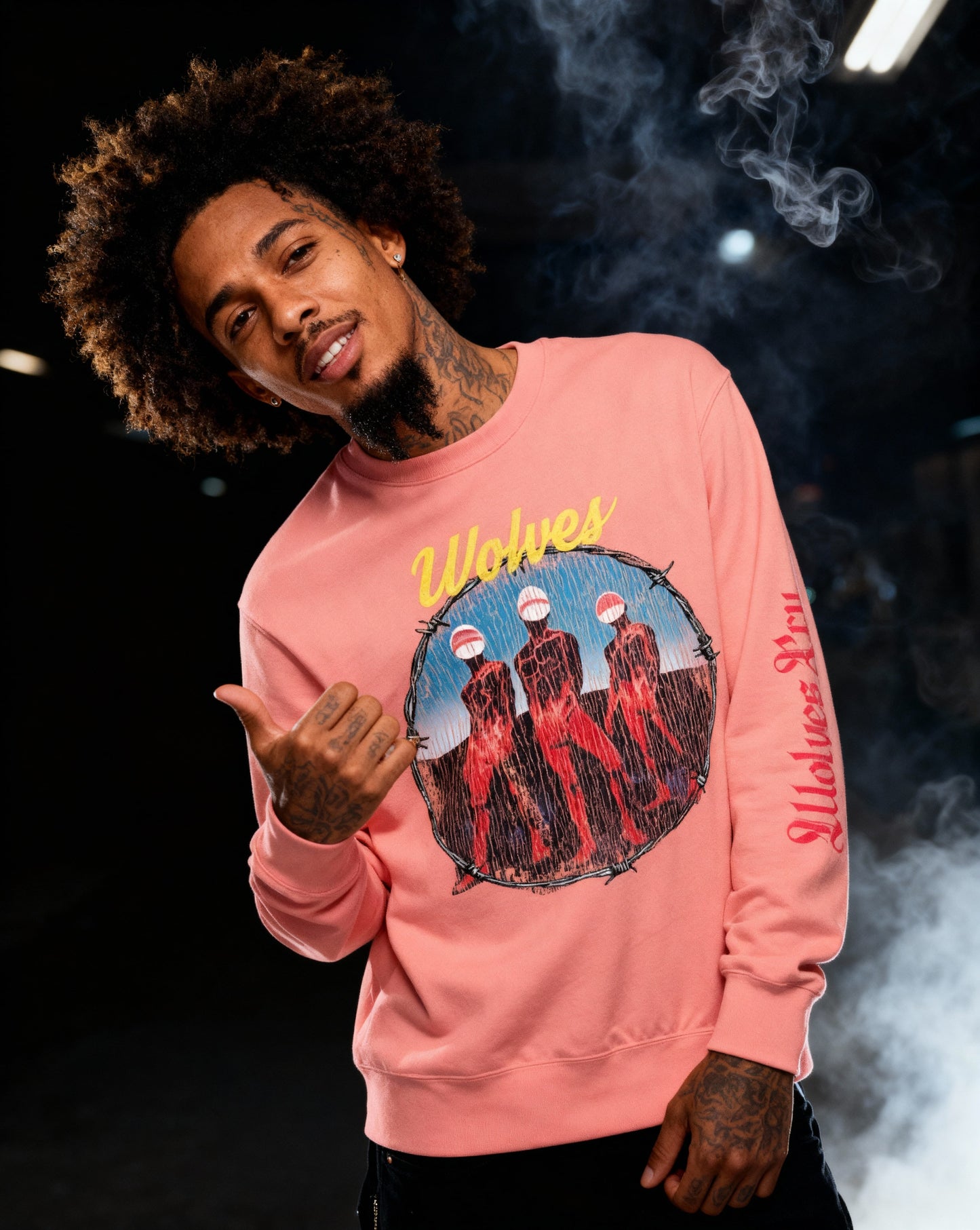  Wolves Cry Descendants crewneck in coral shot in moody studio lighting — nostalgic album-art energy meets modern streetwear silhouette.