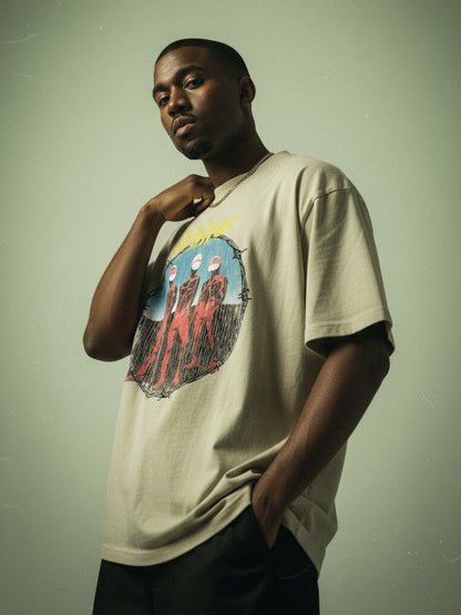 Model wearing Wolves Cry Descendants sage oversized tee — soft green streetwear shirt styled in a modern relaxed silhouette.