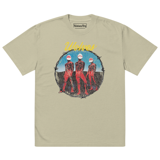 Wolves Cry Descendants oversized tee in sage — muted earth-tone t-shirt with bold multicolor graphic and relaxed vintage streetwear fit.