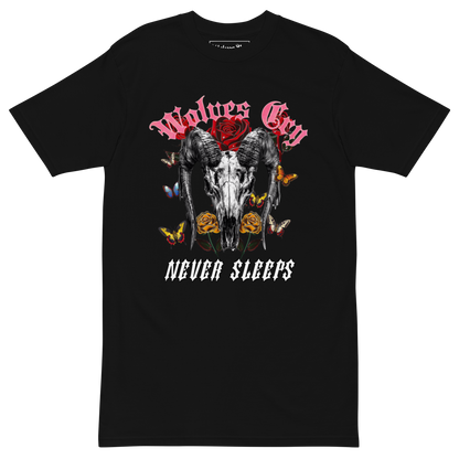 Front mock-up of Wolves Cry DVNS Tee in black — striking “Never Sleeps” skull-and-flower graphic in red and white, printed on heavyweight cotton for timeless streetwear appeal.