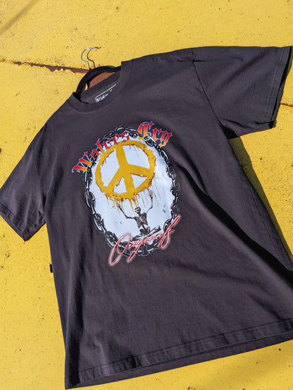 Flat lay of Wolves Cry Endless Peace Tee in black vintage, showcasing aged wash and signature peace-skull design — merging heritage rebellion with quiet strength.