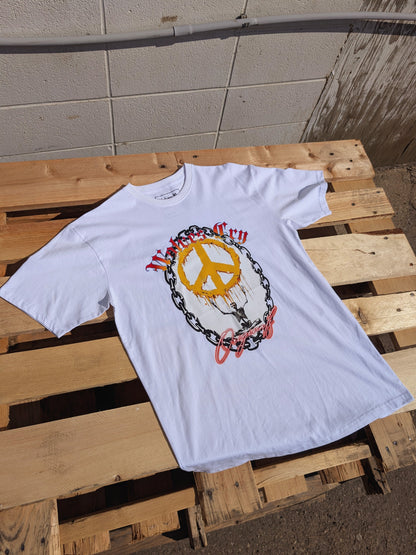 Top-view flat lay of Wolves Cry Endless Peace Tee in white, showing front print detail of peace-skull design and signature Wolves Cry lettering.