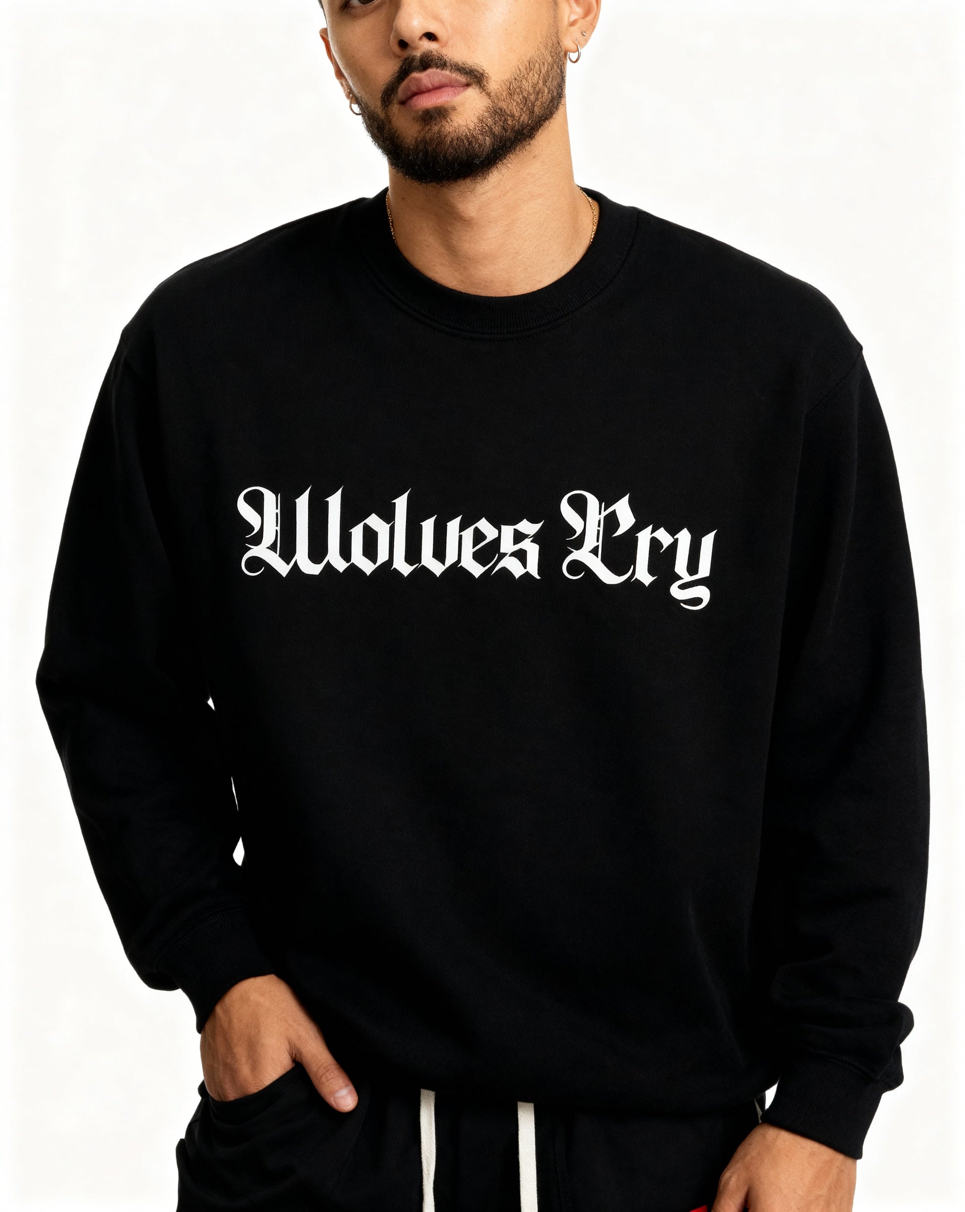 Model wearing Wolves Cry Everyday Crew in black and white — timeless monochrome design blending street heritage with modern simplicity.