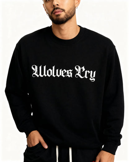 Model wearing Wolves Cry Everyday Crew in black and white — timeless monochrome design blending street heritage with modern simplicity.