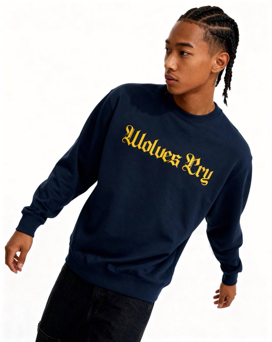 Model wearing Wolves Cry Everyday Crew in navy and yellow — confident, unapologetic, and rooted in classic Wolves Cry identity.