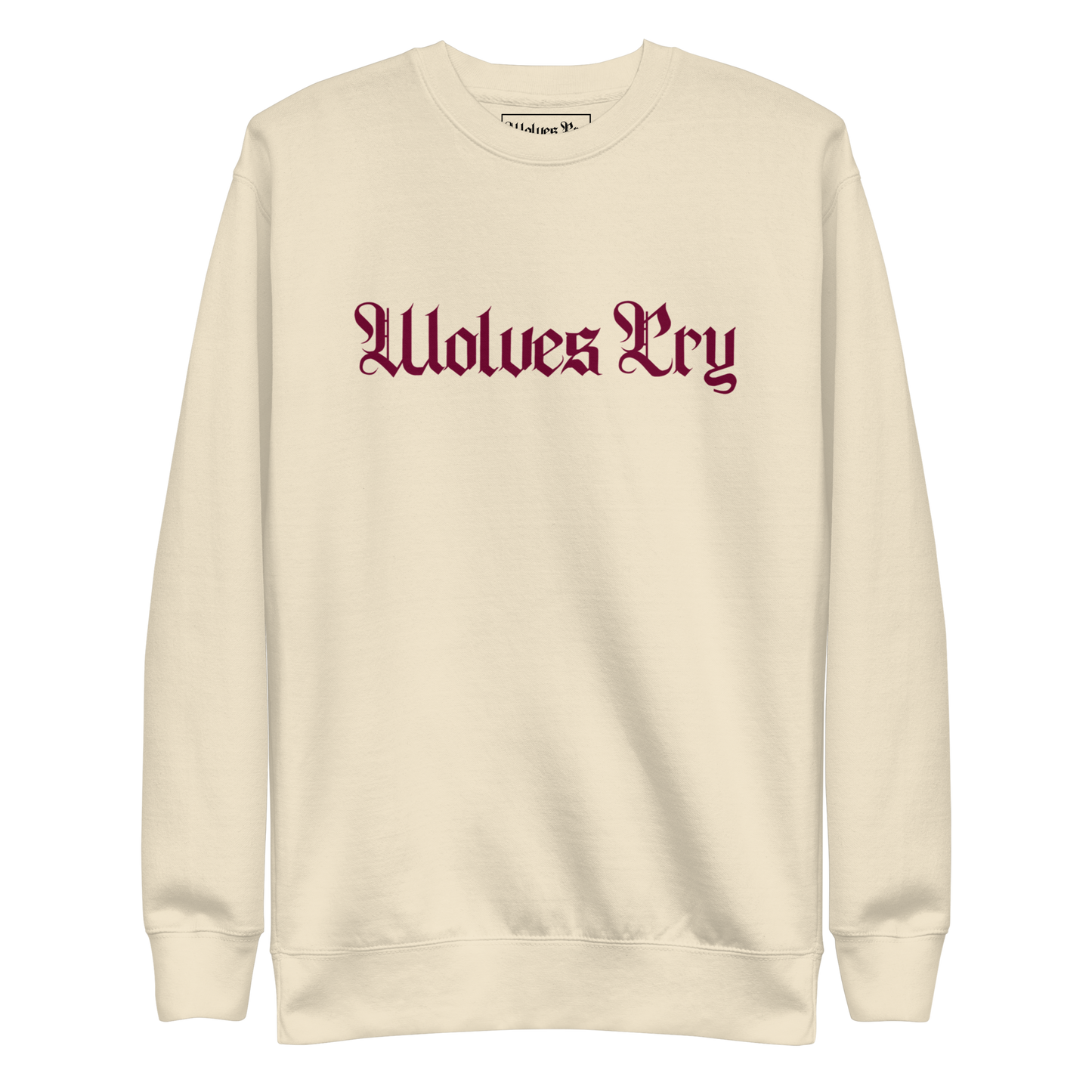Front mock-up of Wolves Cry Everyday Crew in oatmeal with merlot embroidery — soft neutral base with rich contrast for timeless street refinement.