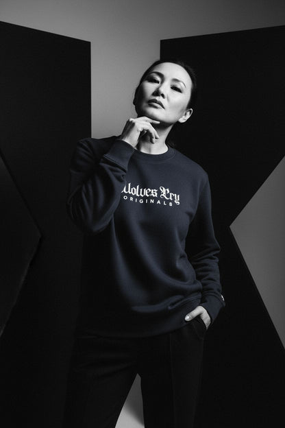 Close-up of Wolves Cry Embroidered Plain Jane Crew in navy, highlighting tonal embroidery detail and heavyweight cotton texture.