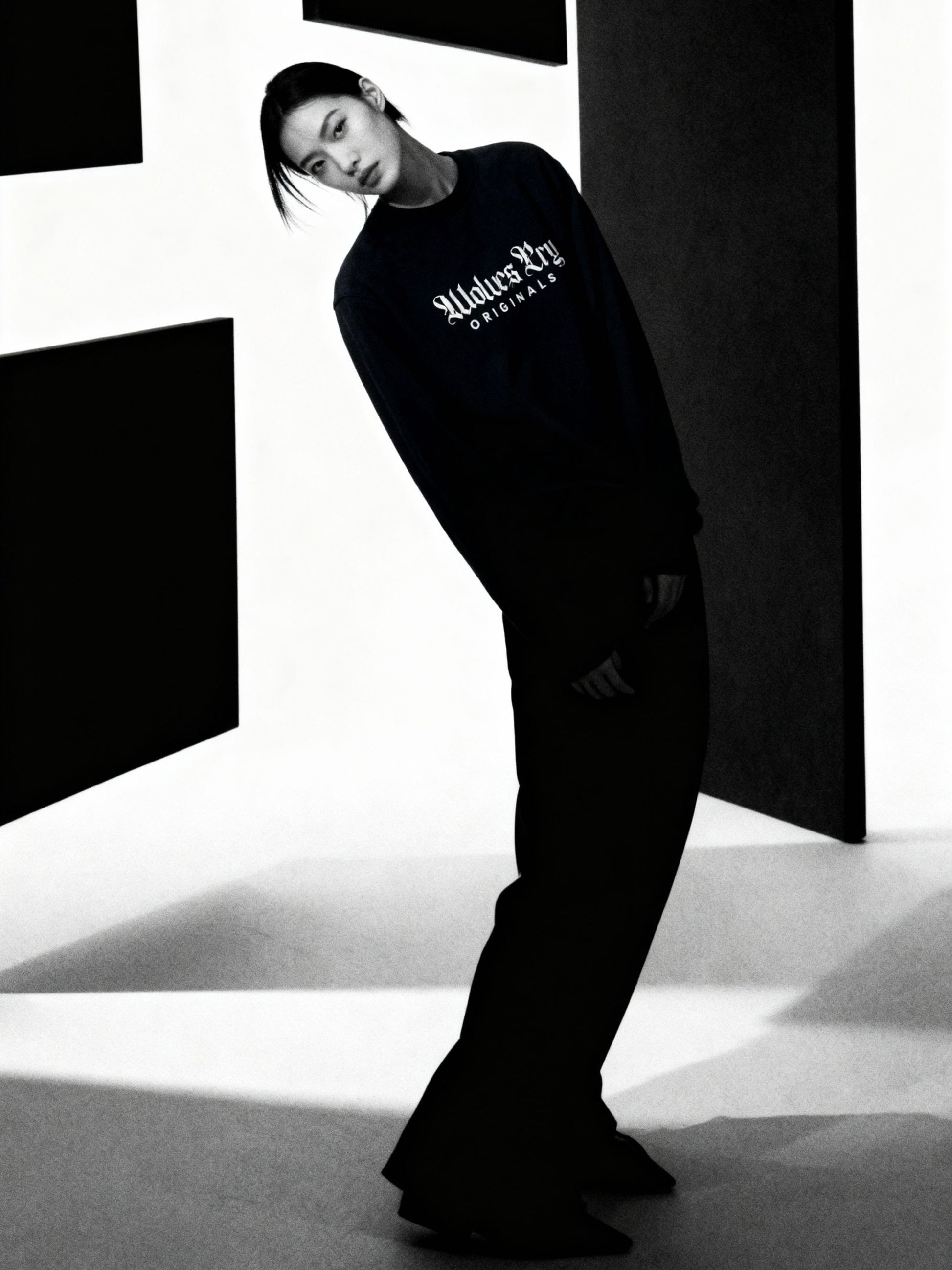 Model wearing Wolves Cry Embroidered Plain Jane Crew in navy, styled with casual streetwear fit and refined simplicity.