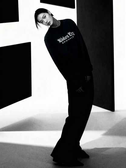 Model wearing Wolves Cry Embroidered Plain Jane Crew in navy, styled with casual streetwear fit and refined simplicity.