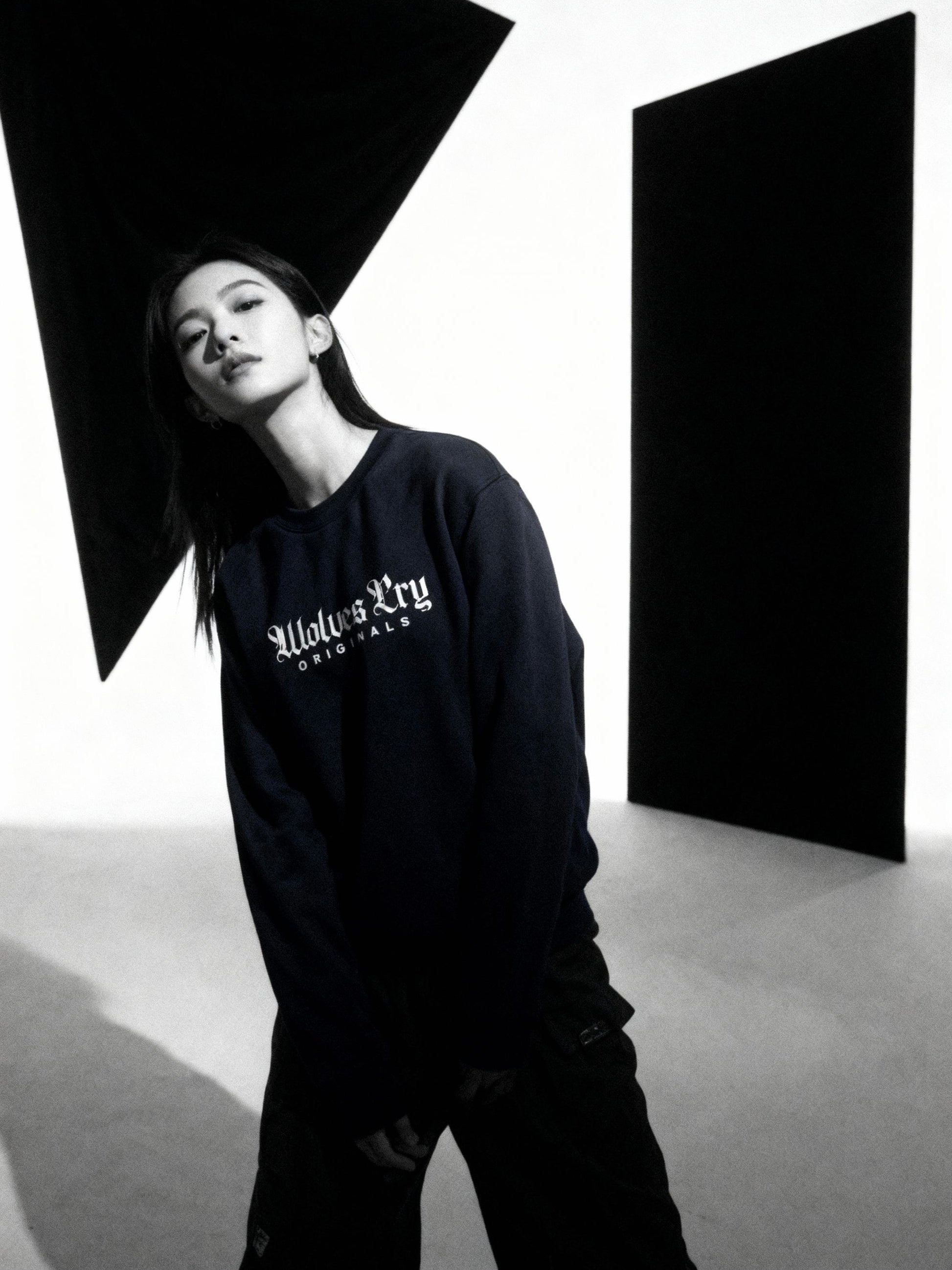 Wolves Cry Embroidered Plain Jane Crew in navy captured in motion — relaxed fit, everyday streetwear elevated through craftsmanship