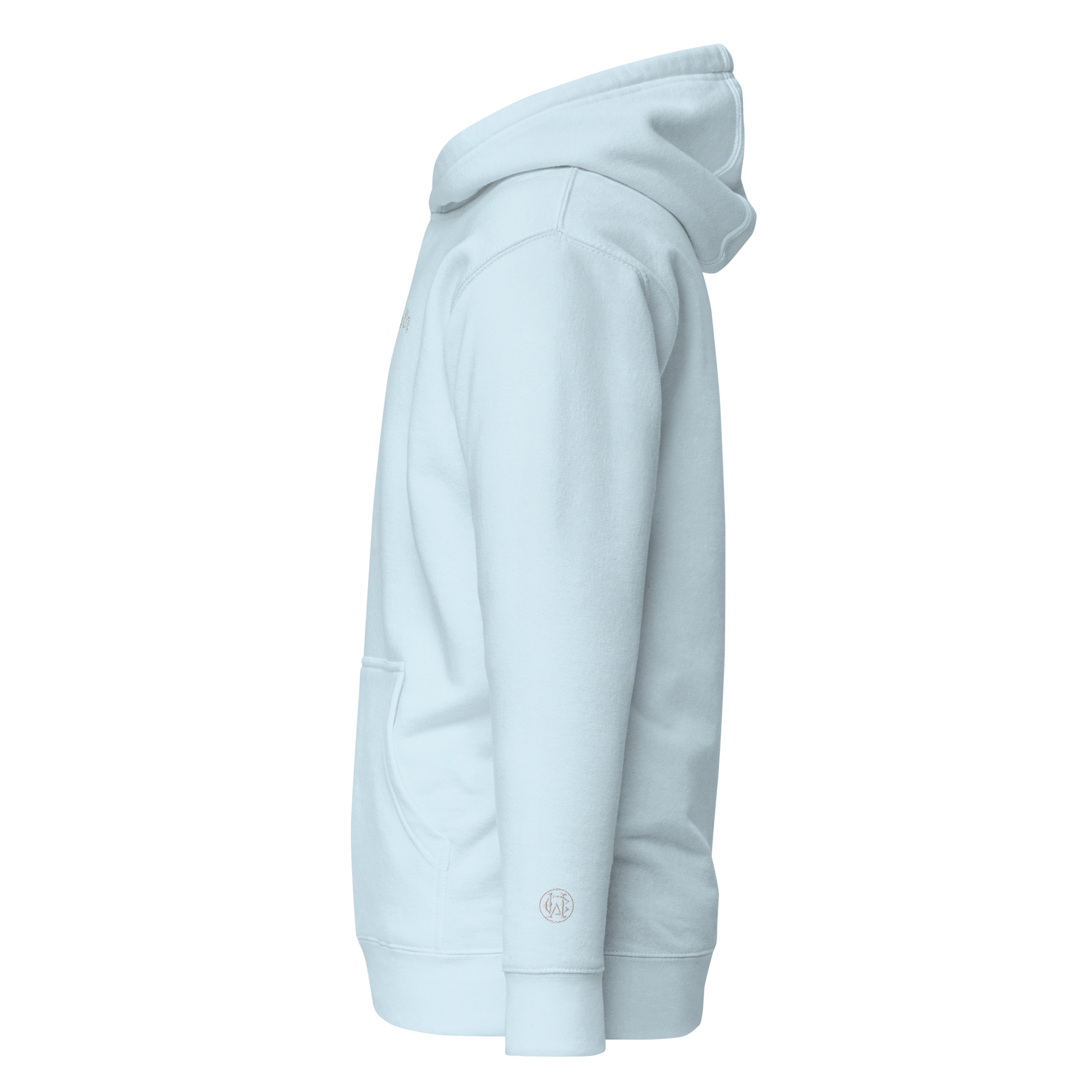 Side angle of baby blue Wolves Cry Hoodie showing clean white WC wrist monogram embroidery — soft, elevated minimalism.
