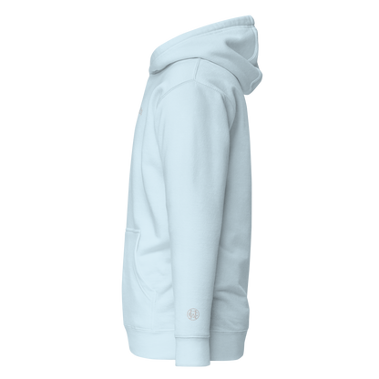 Side angle of baby blue Wolves Cry Hoodie showing clean white WC wrist monogram embroidery — soft, elevated minimalism.