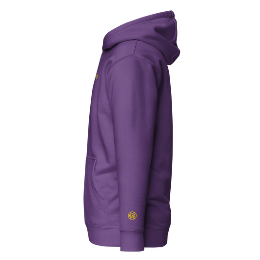 Side view of purple Wolves Cry Hoodie with gold wrist monogram — elevated street classic.