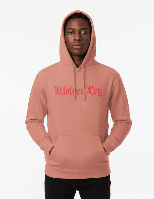 Model wearing Wolves Cry Everyday Spellout Hoodie in double coral — bold tonal contrast capturing unapologetic energy and modern streetwear design.
