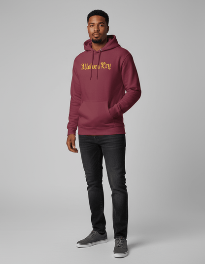 Model wearing Wolves Cry Everyday Spellout Hoodie in maroon and gold on neutral backdrop — everyday comfort with heritage color energy.
