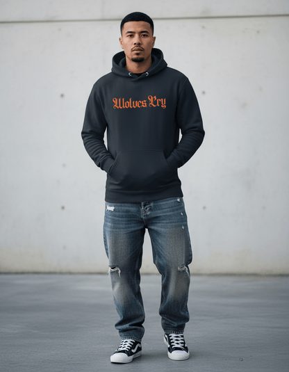 Model wearing Wolves Cry Everyday Spellout Hoodie in navy and orange under studio lighting — clean, confident streetwear with vintage sports energy.
