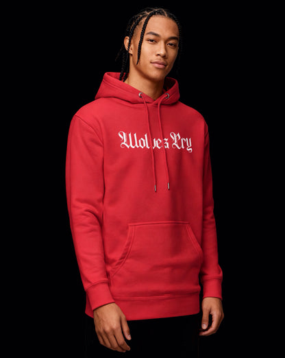 Studio shot of Wolves Cry Everyday Spellout Hoodie — rich red cotton with Wolves Cry embroidered logo in white.