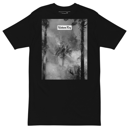 Wolves Cry Originals Malibu Flame Tee in black, featuring a bold graphic of a palm tree consumed by flames. Crafted from heavyweight combed cotton for a premium feel and relaxed fit. Designed for those who embrace the poetic contrast of beauty and destruction in streetwear style.