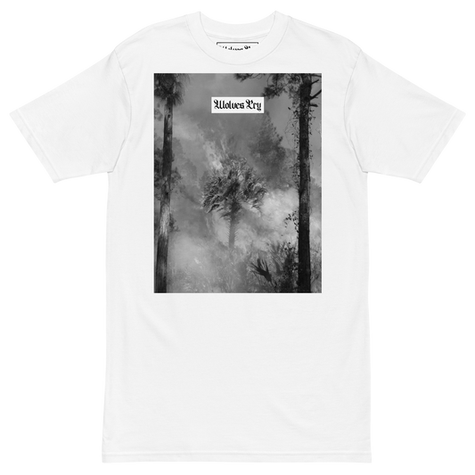 Wolves Cry Originals Malibu Flame Tee in white, showcasing a striking graphic of a palm tree engulfed in flames. Made from premium heavyweight cotton for a relaxed fit and maximum comfort. A statement piece blending poetic visuals with streetwear essentials.