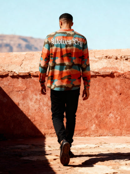 Side profile of Wolves Cry Marrakech Camo Jersey styled with black pants — casual streetwear with a bold camo aesthetic.