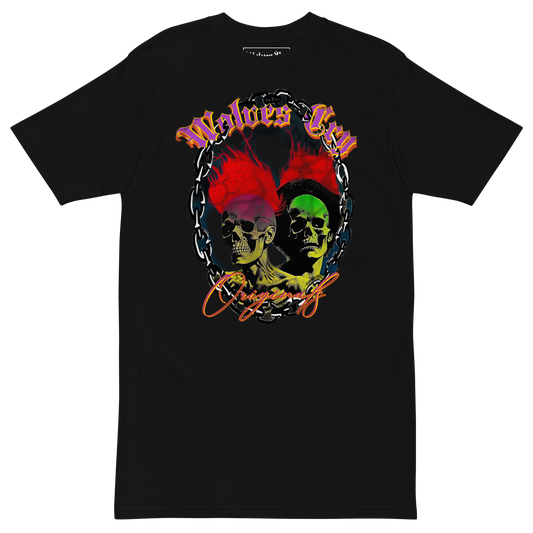 Mockup photo of Wolves Cry Megadeath Tee in black — worn by model outdoors, showcasing the bold skull-and-floral graphic print with red, yellow, and green highlights on heavyweight cotton.